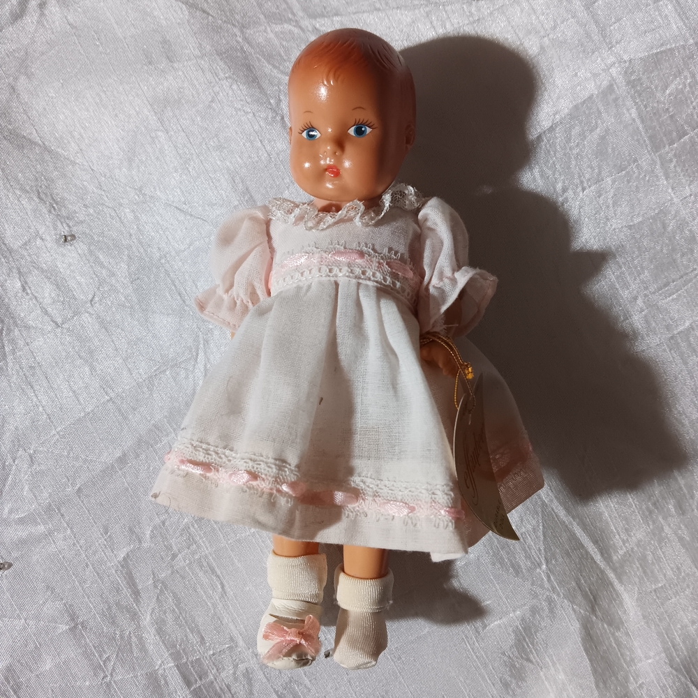 Adorable Pink and White Baby Doll